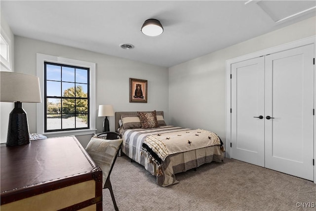 bedroom with light carpet