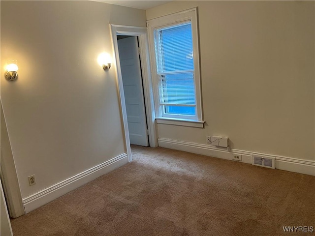 view of carpeted spare room