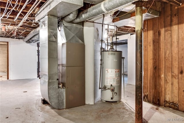 utilities featuring heating unit and gas water heater