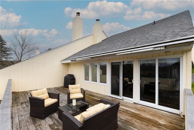 wooden deck featuring area for grilling