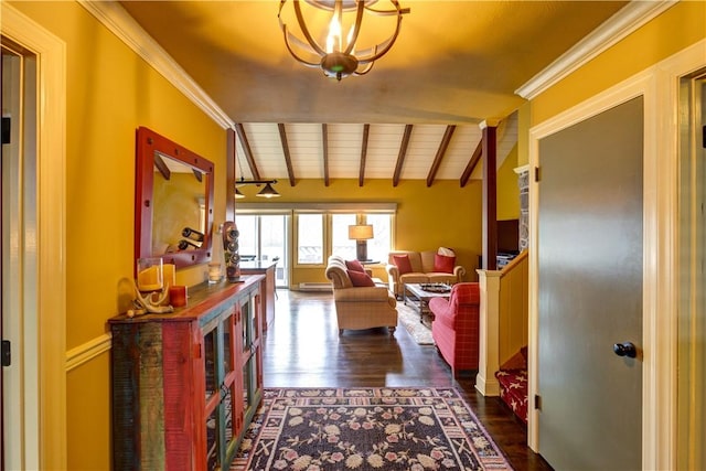 interior space with vaulted ceiling with beams, dark hardwood / wood-style flooring, and ornamental molding