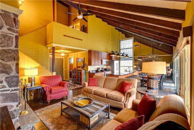 living room featuring beam ceiling, ceiling fan, high vaulted ceiling, and hardwood / wood-style flooring