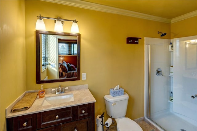 bathroom with vanity, toilet, an enclosed shower, and ornamental molding