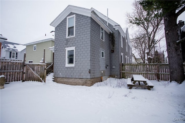 view of snow covered house