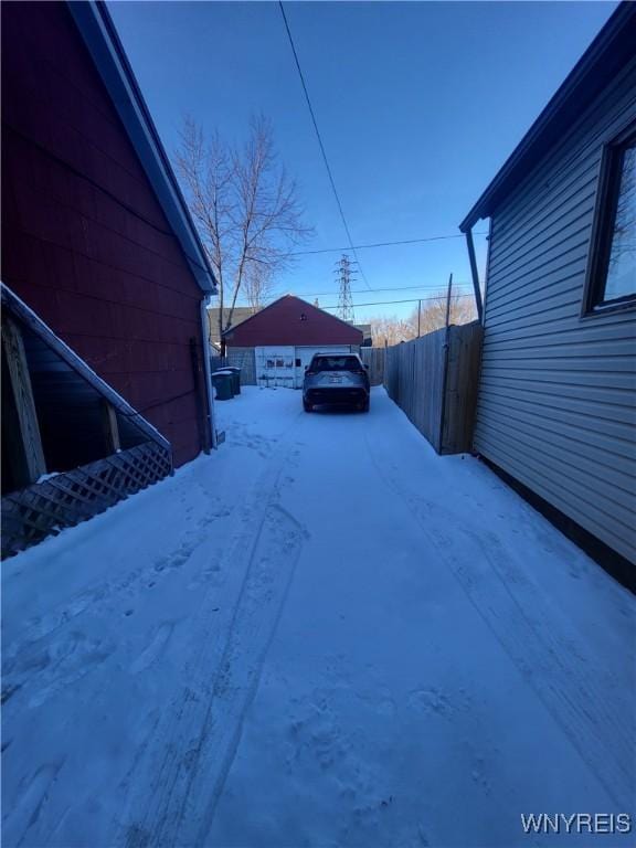 view of yard layered in snow