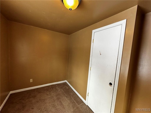 empty room with carpet flooring