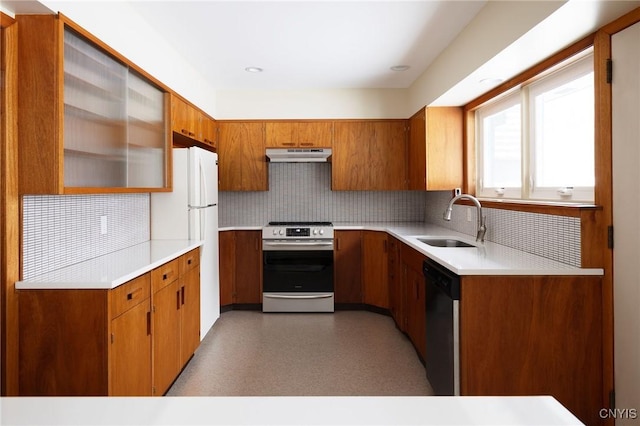 kitchen featuring tasteful backsplash, sink, electric range, white refrigerator, and dishwasher