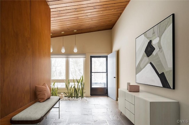 doorway featuring vaulted ceiling and wooden ceiling