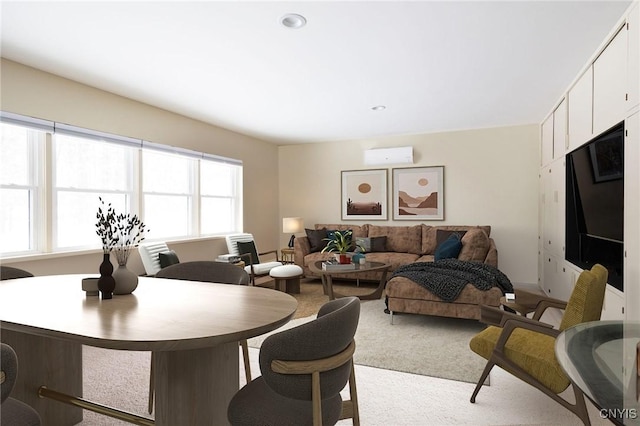 carpeted living room featuring an AC wall unit