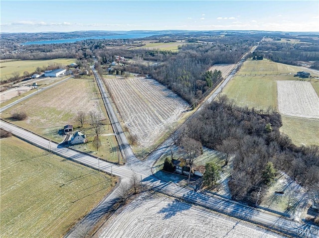 birds eye view of property featuring a rural view