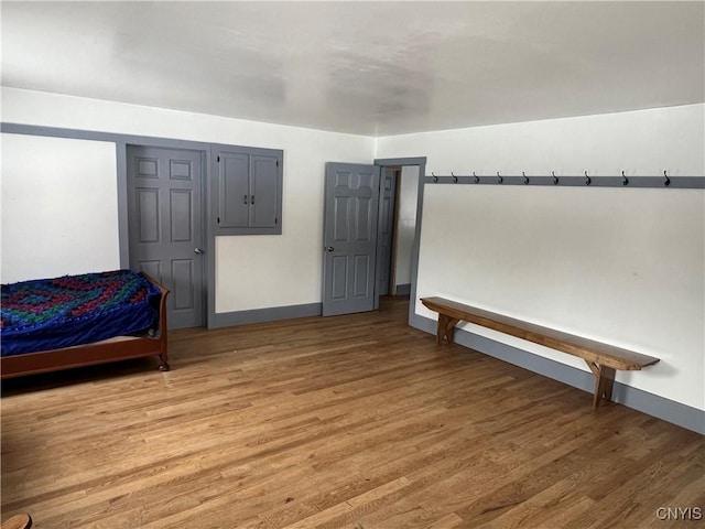 bedroom featuring hardwood / wood-style floors