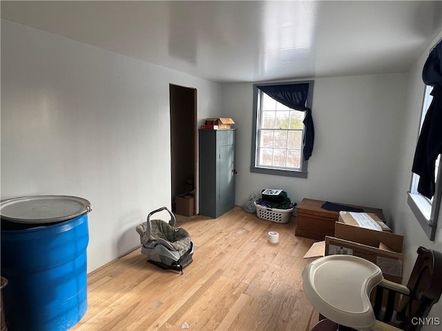 miscellaneous room with light wood-type flooring