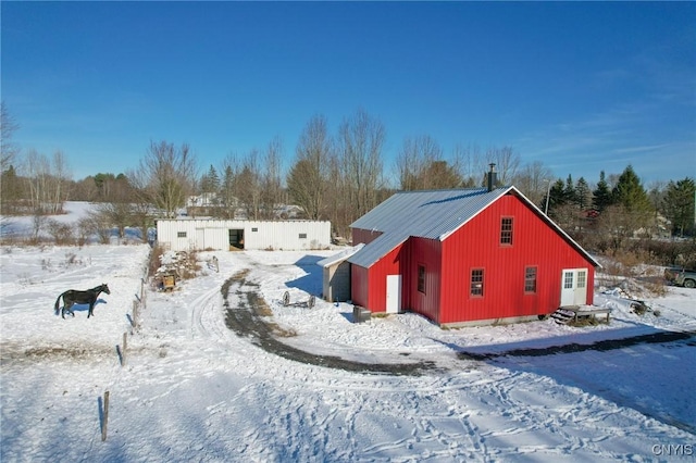 view of snow covered property