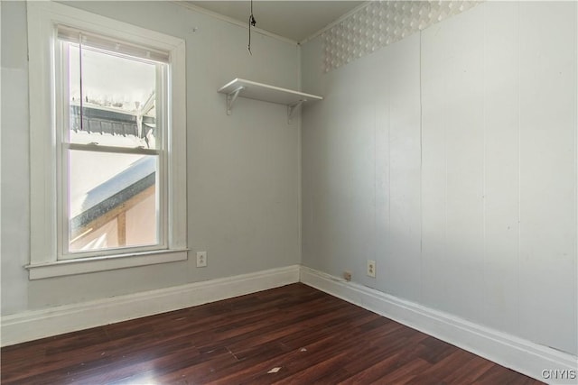 spare room featuring dark hardwood / wood-style floors