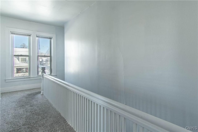 corridor featuring carpet flooring