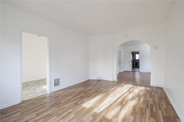 unfurnished room featuring wood-type flooring