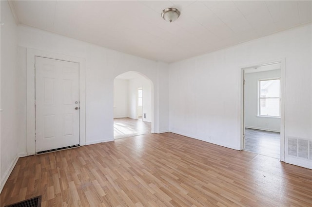 unfurnished room featuring light hardwood / wood-style floors