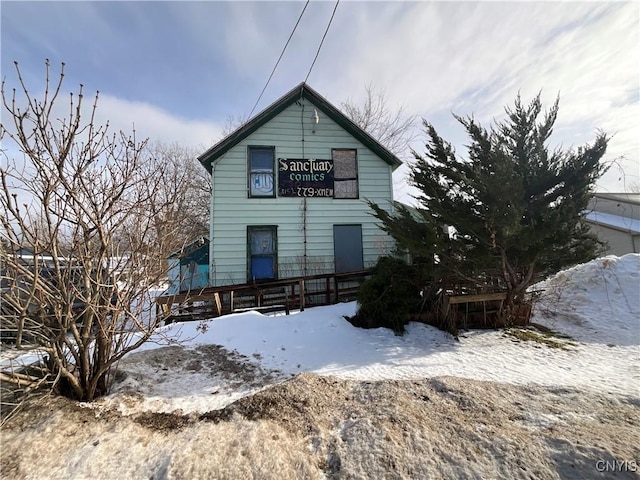 view of snow covered house