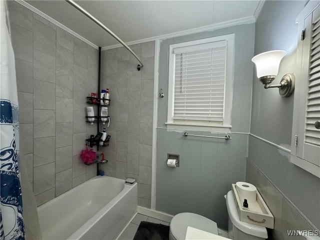 bathroom with tile patterned floors, shower / bath combination with curtain, toilet, and ornamental molding
