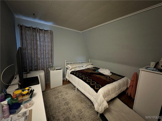 bedroom featuring crown molding