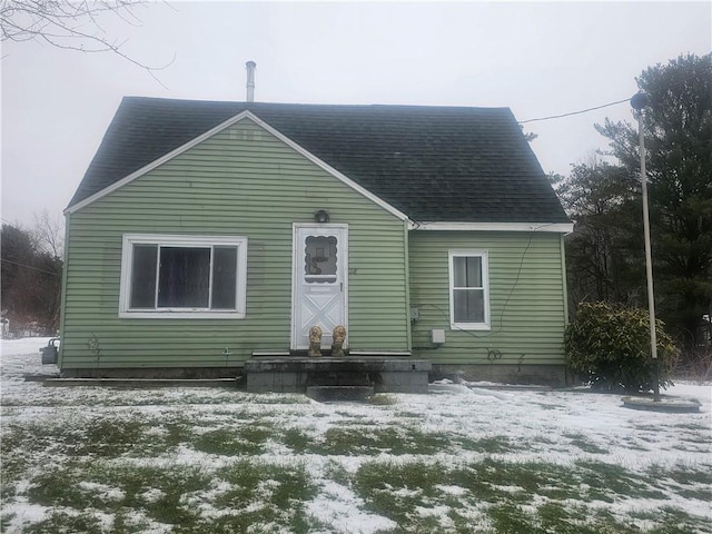 view of snow covered house