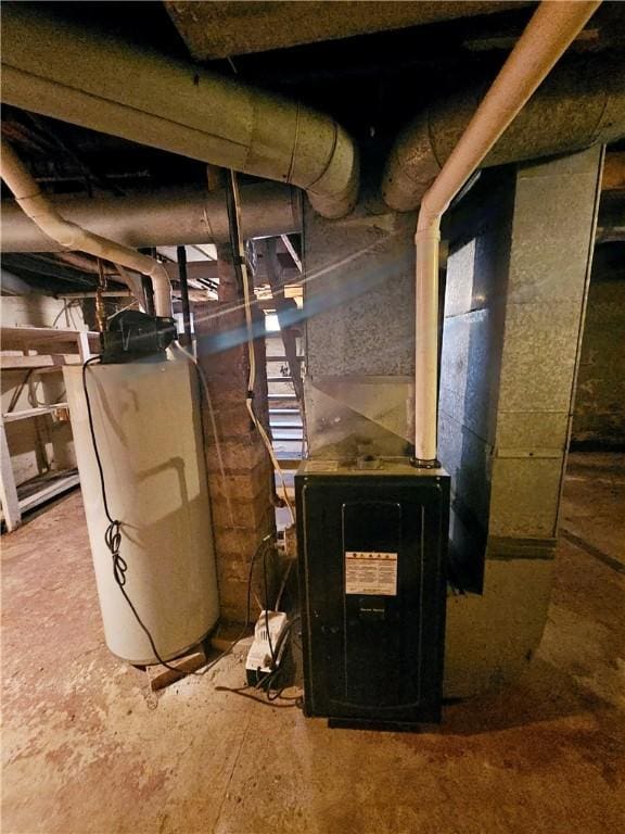 utility room featuring water heater