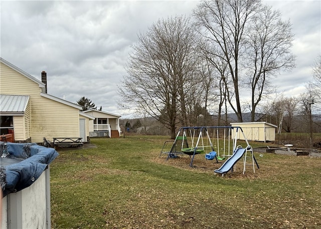 view of yard featuring a playground