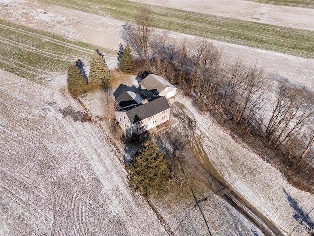 birds eye view of property with a rural view