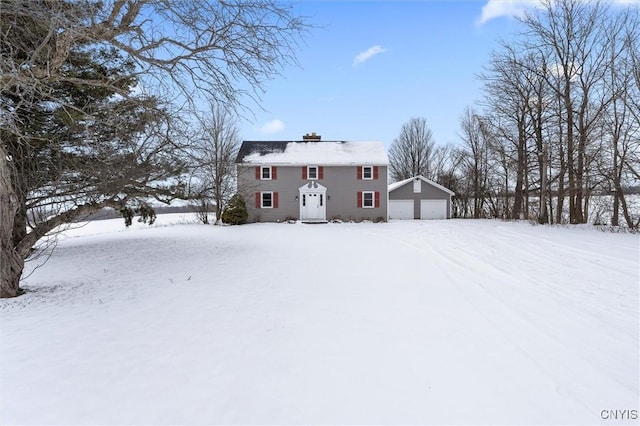 view of front of home featuring an outbuilding and a garage