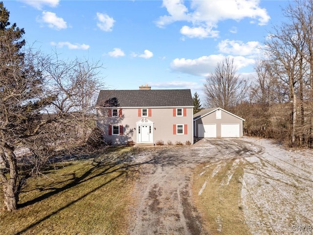 colonial home with a garage