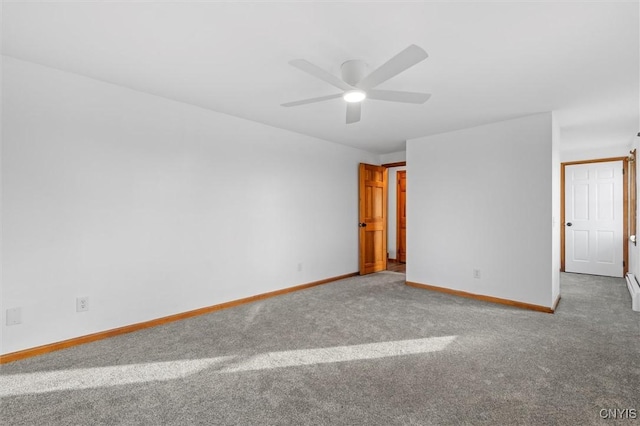 carpeted empty room with ceiling fan