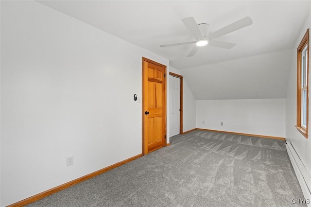 bonus room with carpet, ceiling fan, lofted ceiling, and a baseboard radiator