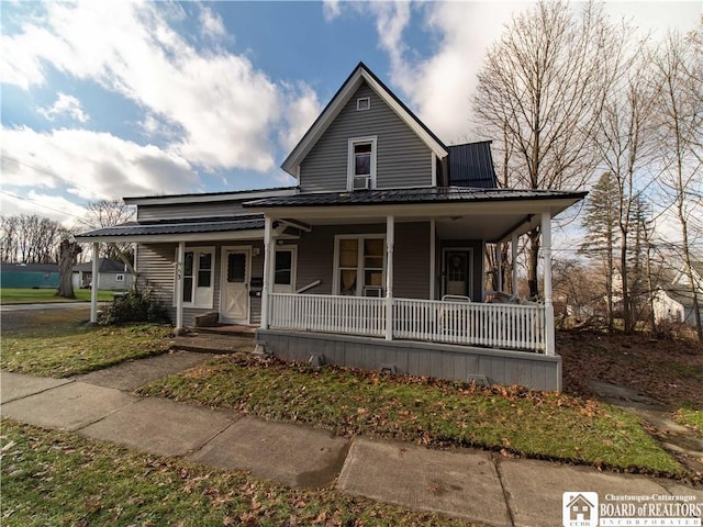 country-style home with covered porch