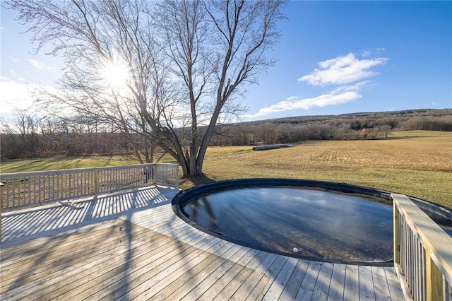 wooden deck with a yard