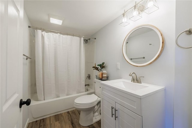 full bathroom featuring toilet, vanity, shower / tub combo, and hardwood / wood-style flooring