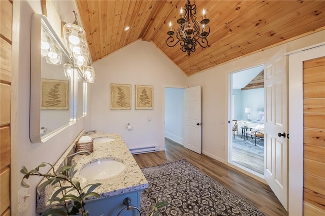 bathroom with wooden ceiling, baseboard heating, lofted ceiling with beams, wood-type flooring, and vanity