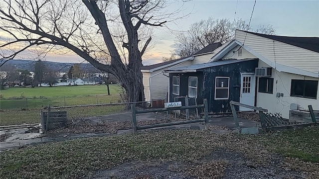 view of property exterior at dusk