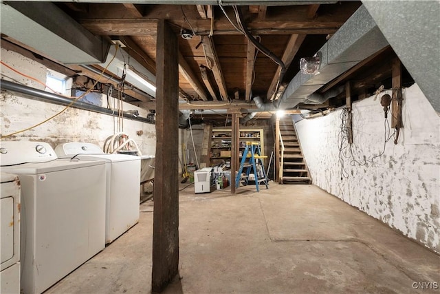 basement with washer and clothes dryer