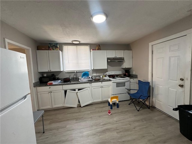 kitchen featuring white cabinets, white appliances, and light hardwood / wood-style flooring