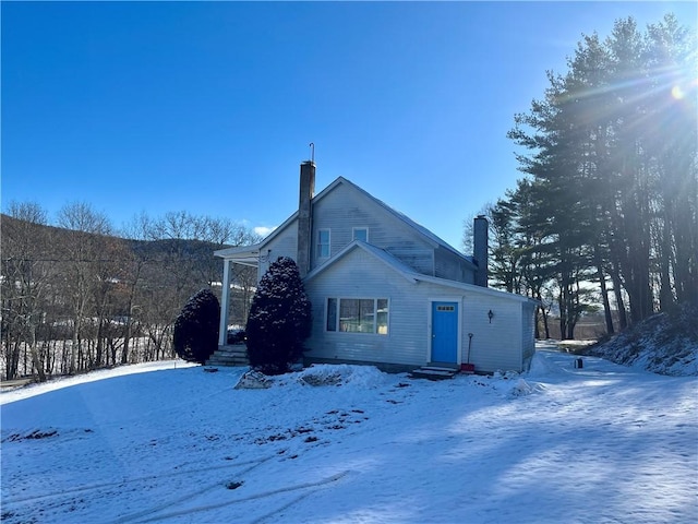 view of snow covered property