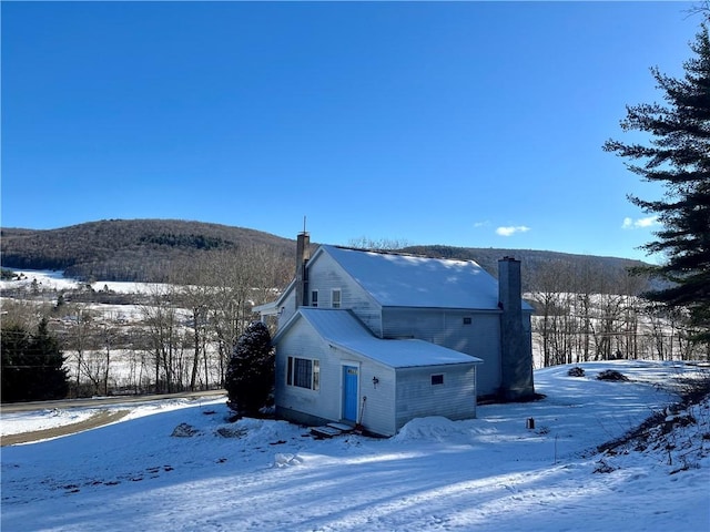 view of snow covered property