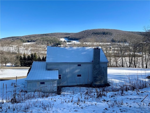 exterior space featuring a mountain view