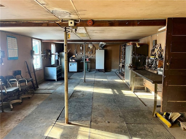 basement with a workshop area