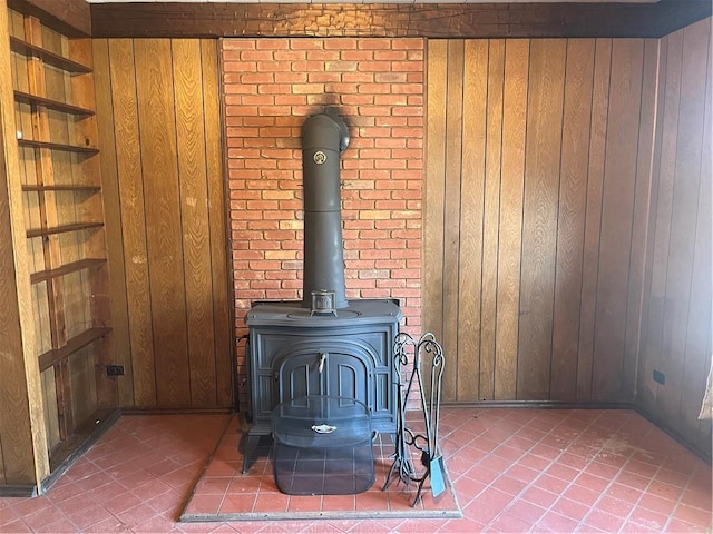 details with a wood stove and wooden walls