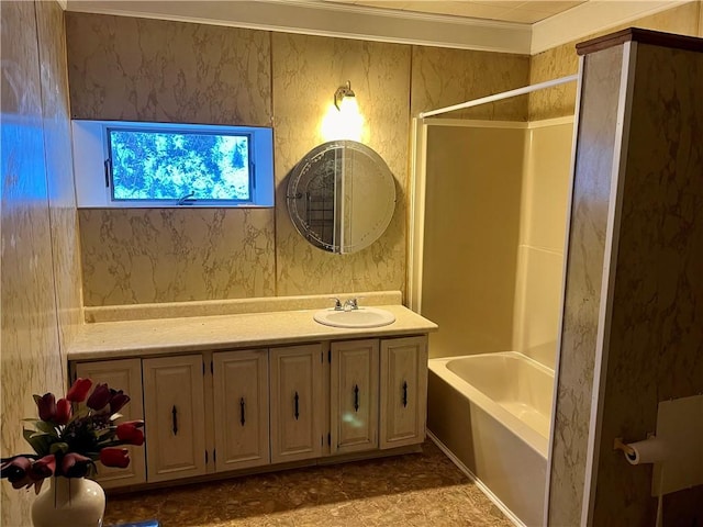 bathroom featuring vanity, shower / bathtub combination, and ornamental molding