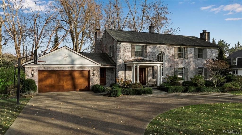 colonial house featuring a garage