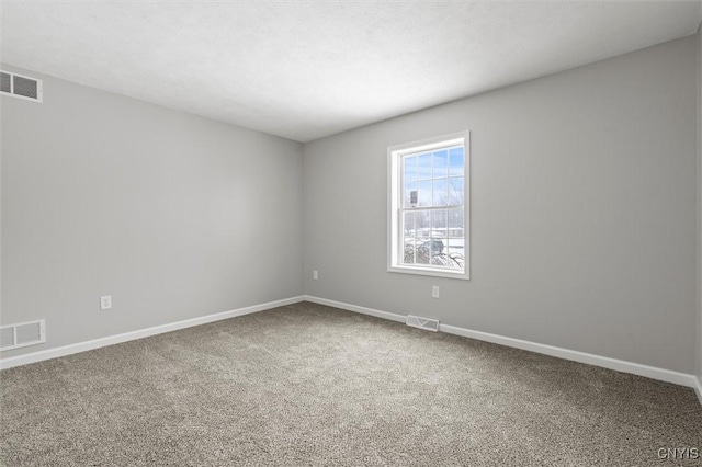 unfurnished room with carpet