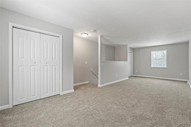 basement featuring carpet