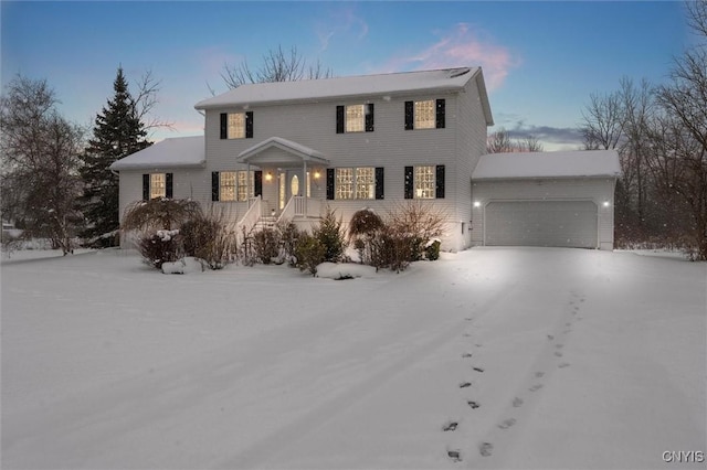 view of front of property featuring a garage