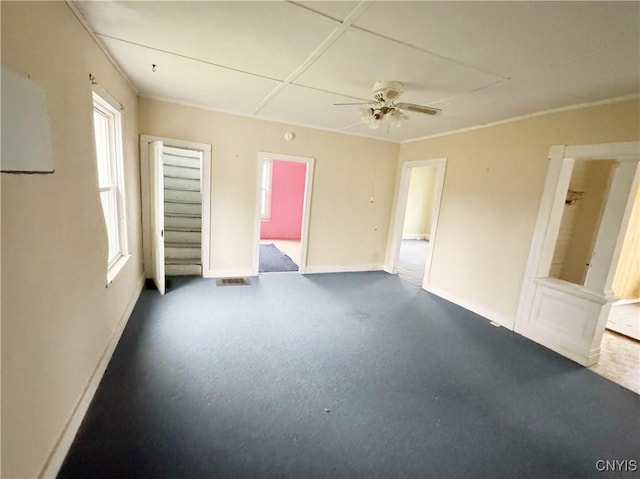 unfurnished room featuring ceiling fan